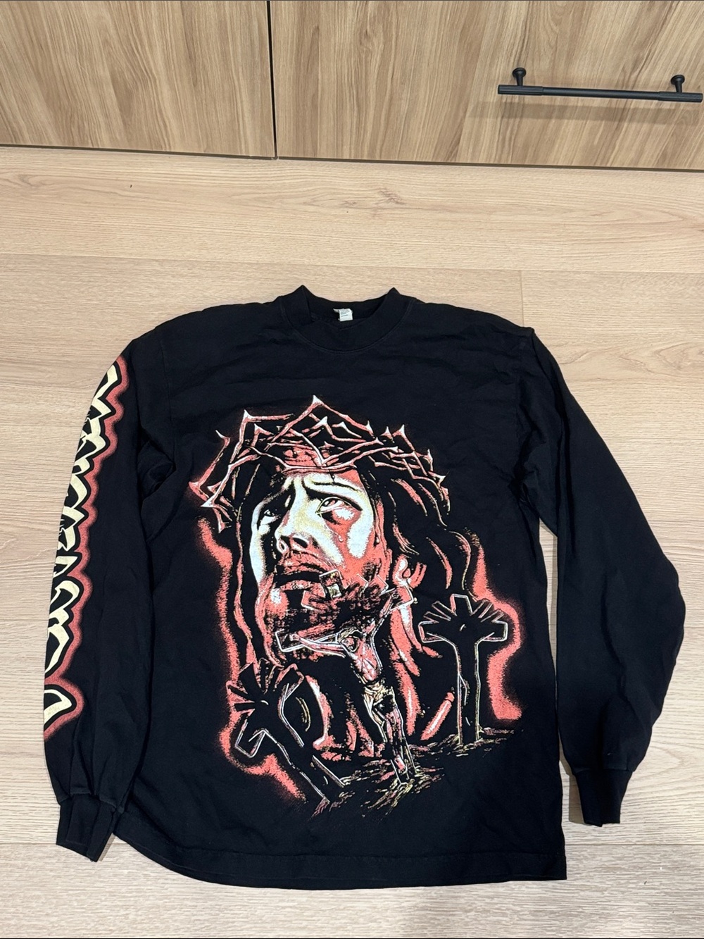 Black Jesus vertebrae Graphic Long Sleeve Tee with Red and Cream Crucifix Design